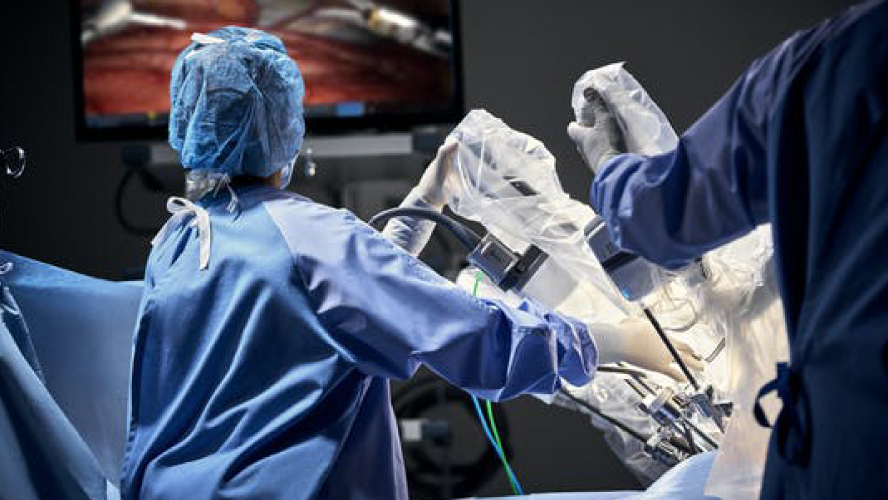 Medical team supervises the Da Vinci robot-assisted procedure on screen. Photo source: Intuitive Surgical, Inc.