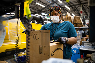 An Amazon associate in an Amazon warehouse